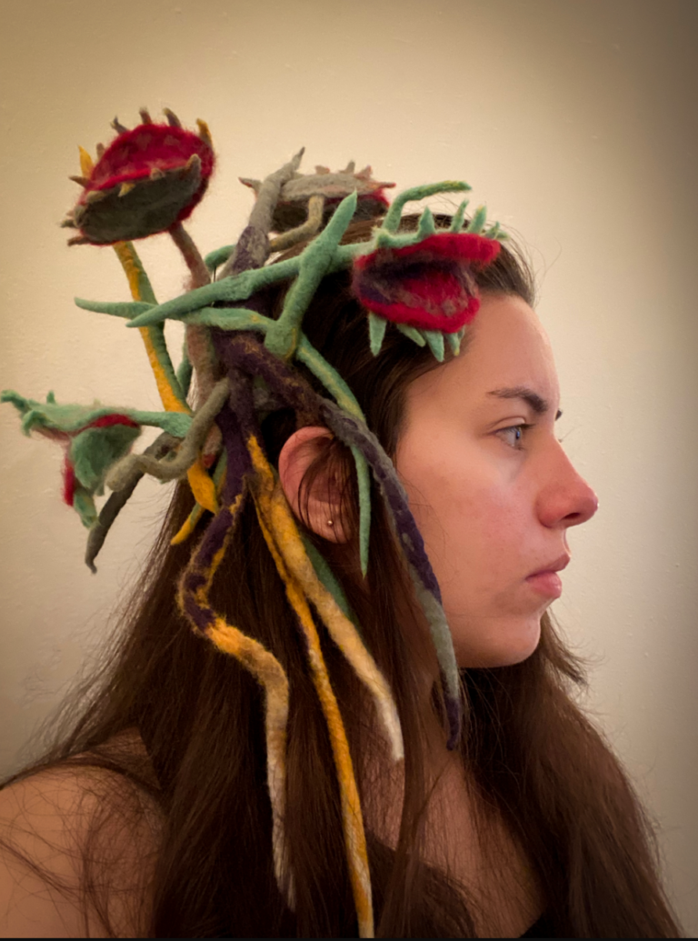 08/18/2021 Women with Flowera A young woman with cacti plant vines in her hair