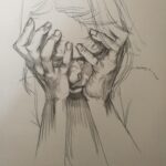 a young girl caressing her face into her hands